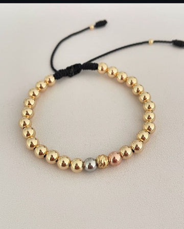 Pulsera con Balines #5 tres oros
