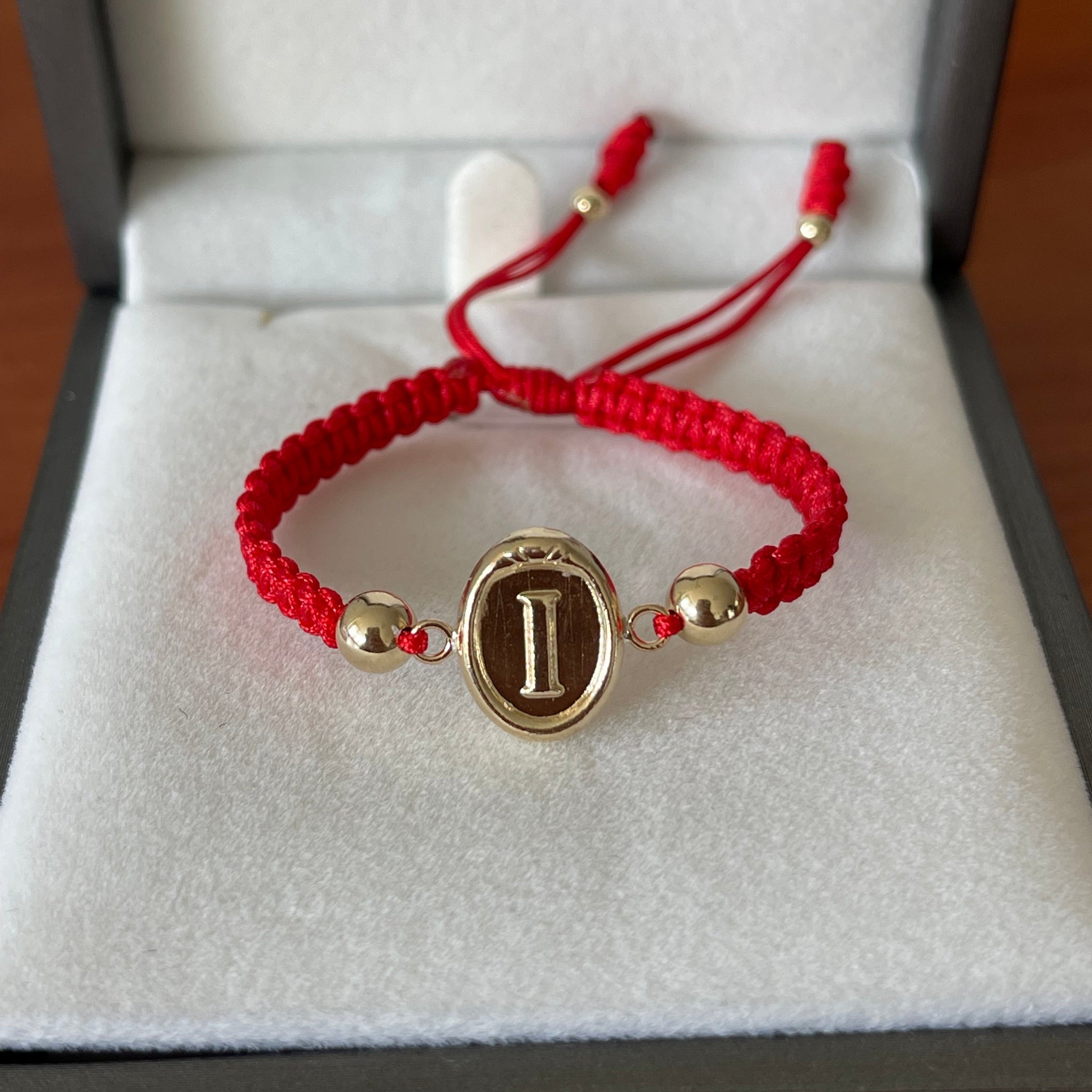 Pulsera de bebé con inicial